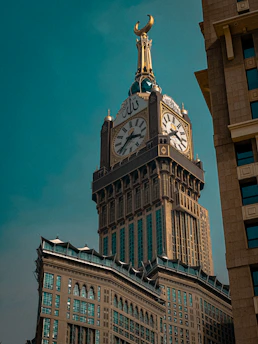 A large building with a clock on the top of it