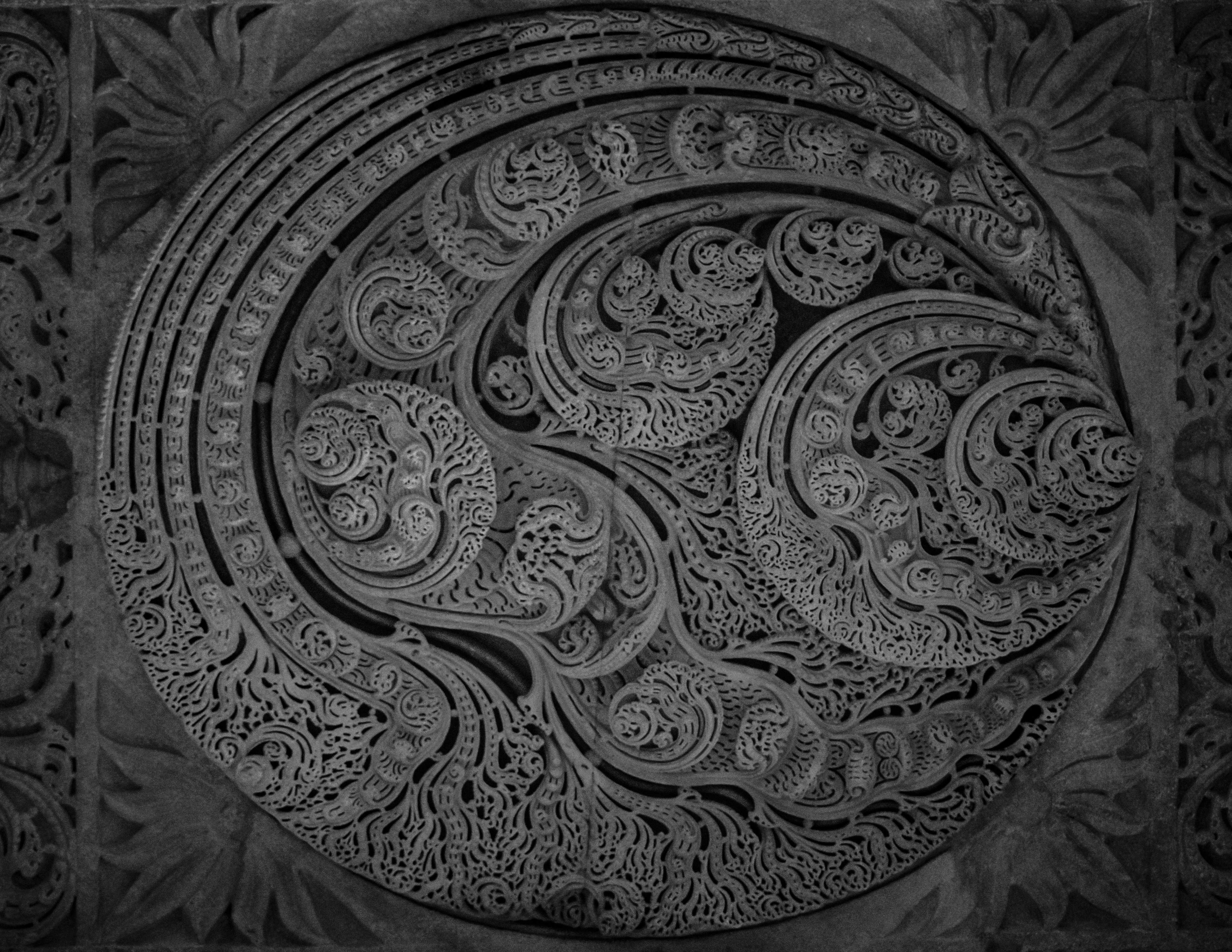 A black and white photo of a circular object