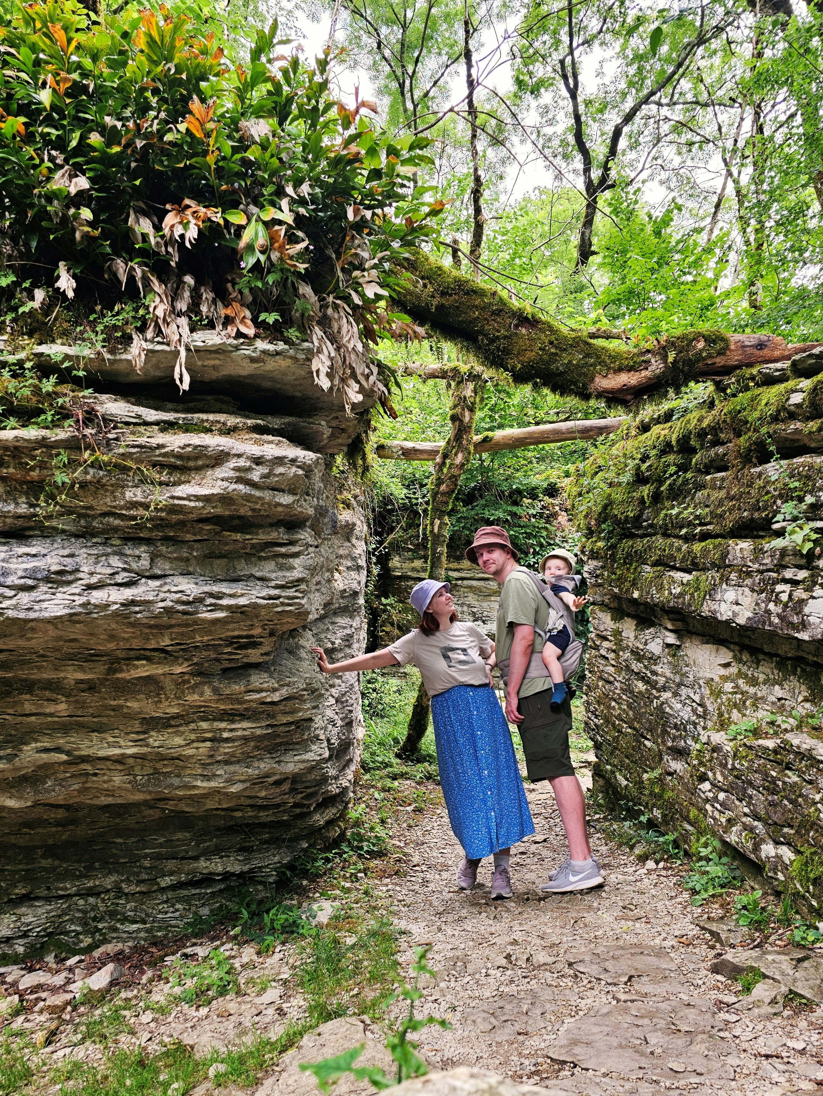 A couple of people that are standing in the dirt