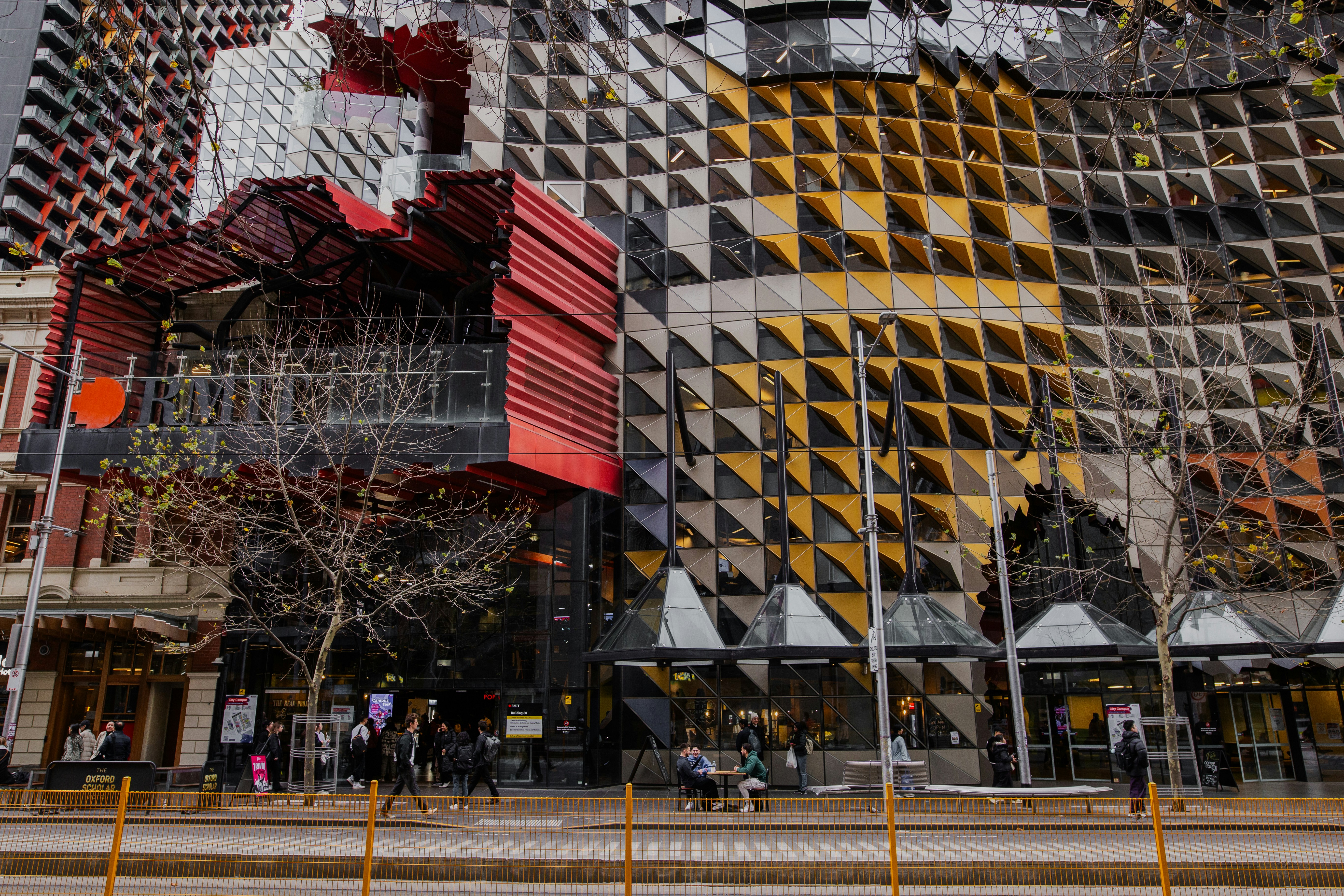A large building that has a lot of windows on it