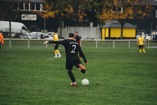 A group of young men playing a game of soccer