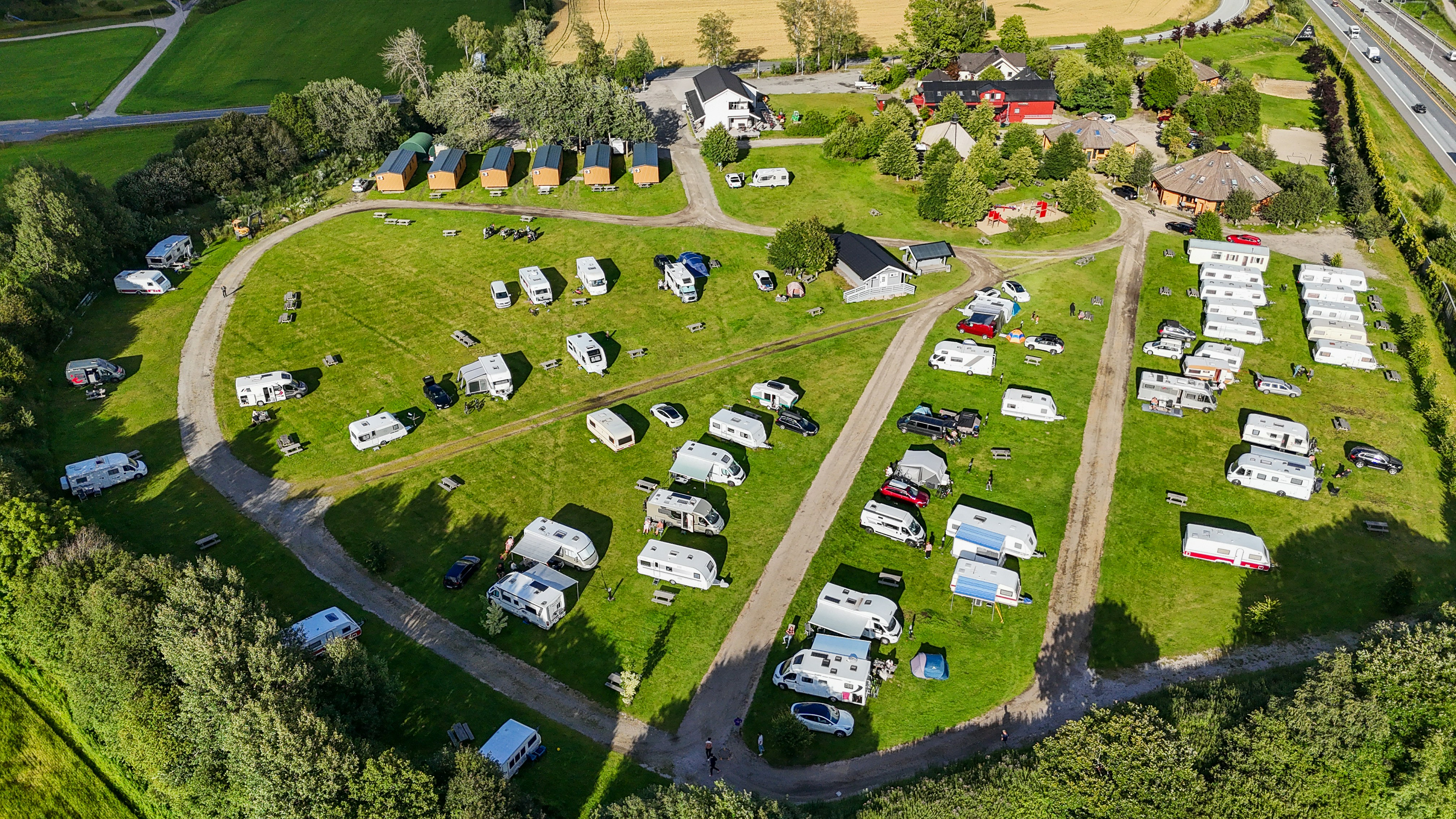Holiday park with static caravans and parked vehicles