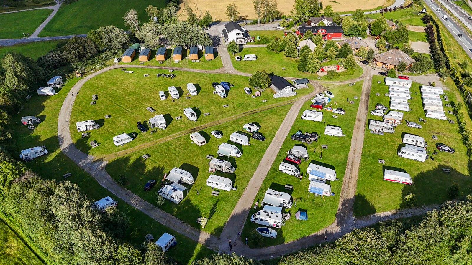 Aerial view of a holiday park with rows of static caravans