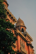 A tall building with a clock on the top of it
