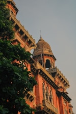 A tall building with a clock on the top of it