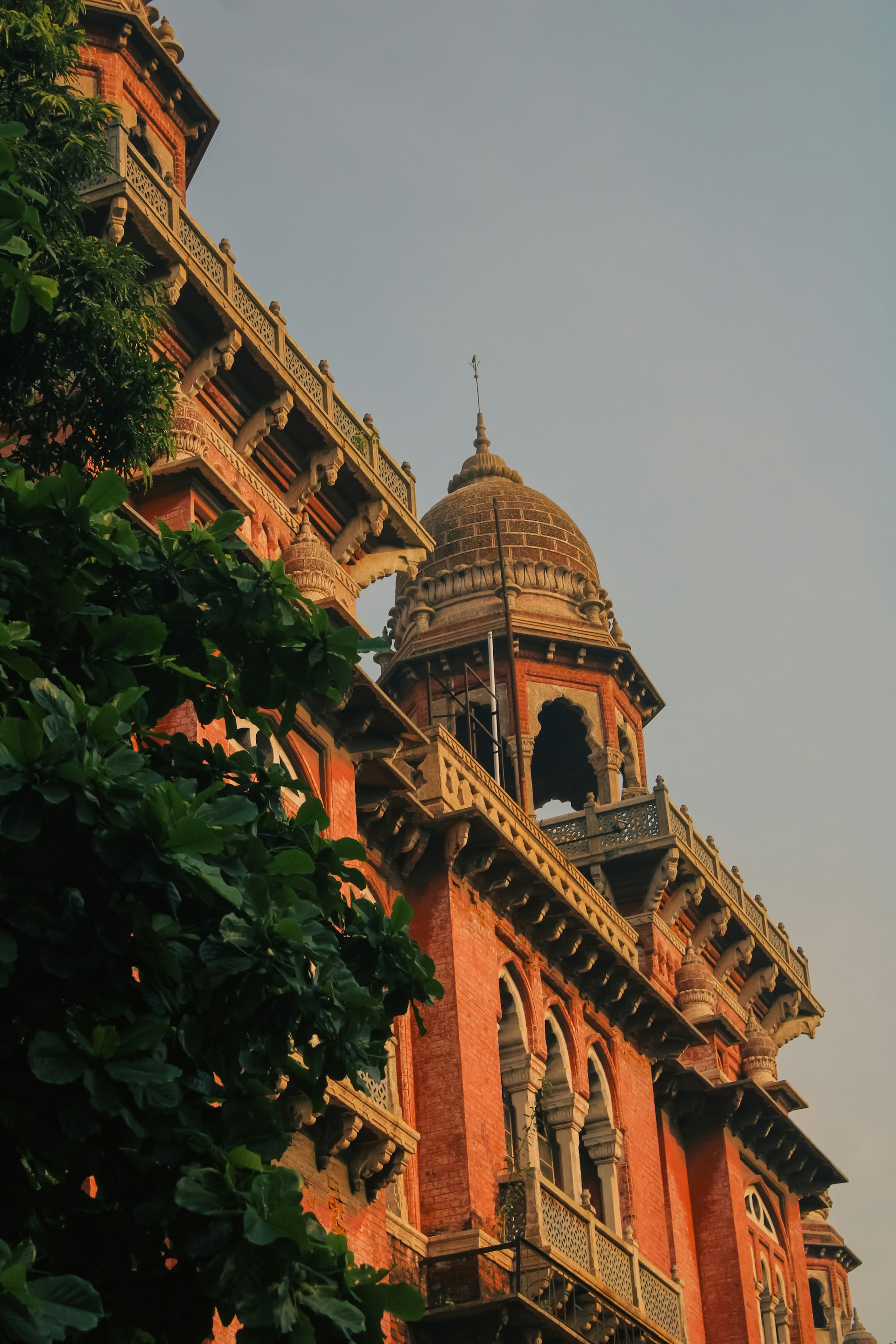 A tall building with a clock on the top of it