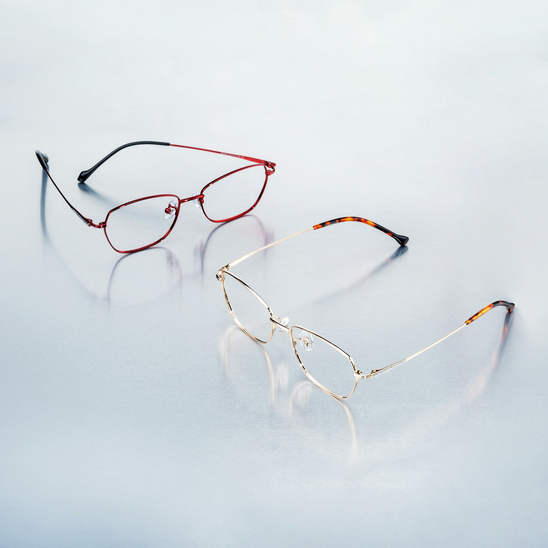 A pair of glasses sitting on top of a cloud filled sky