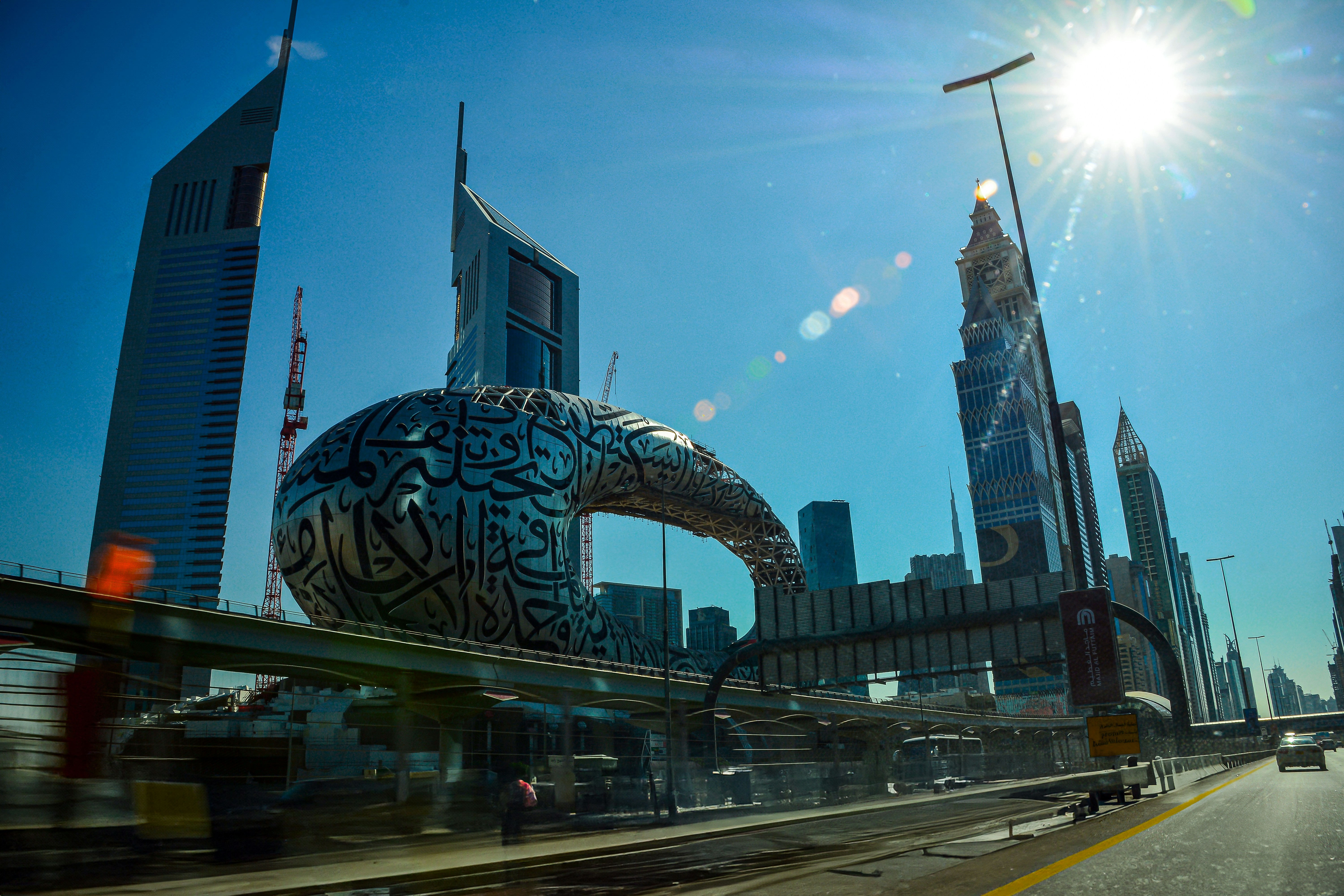 A view of a city from a moving vehicle