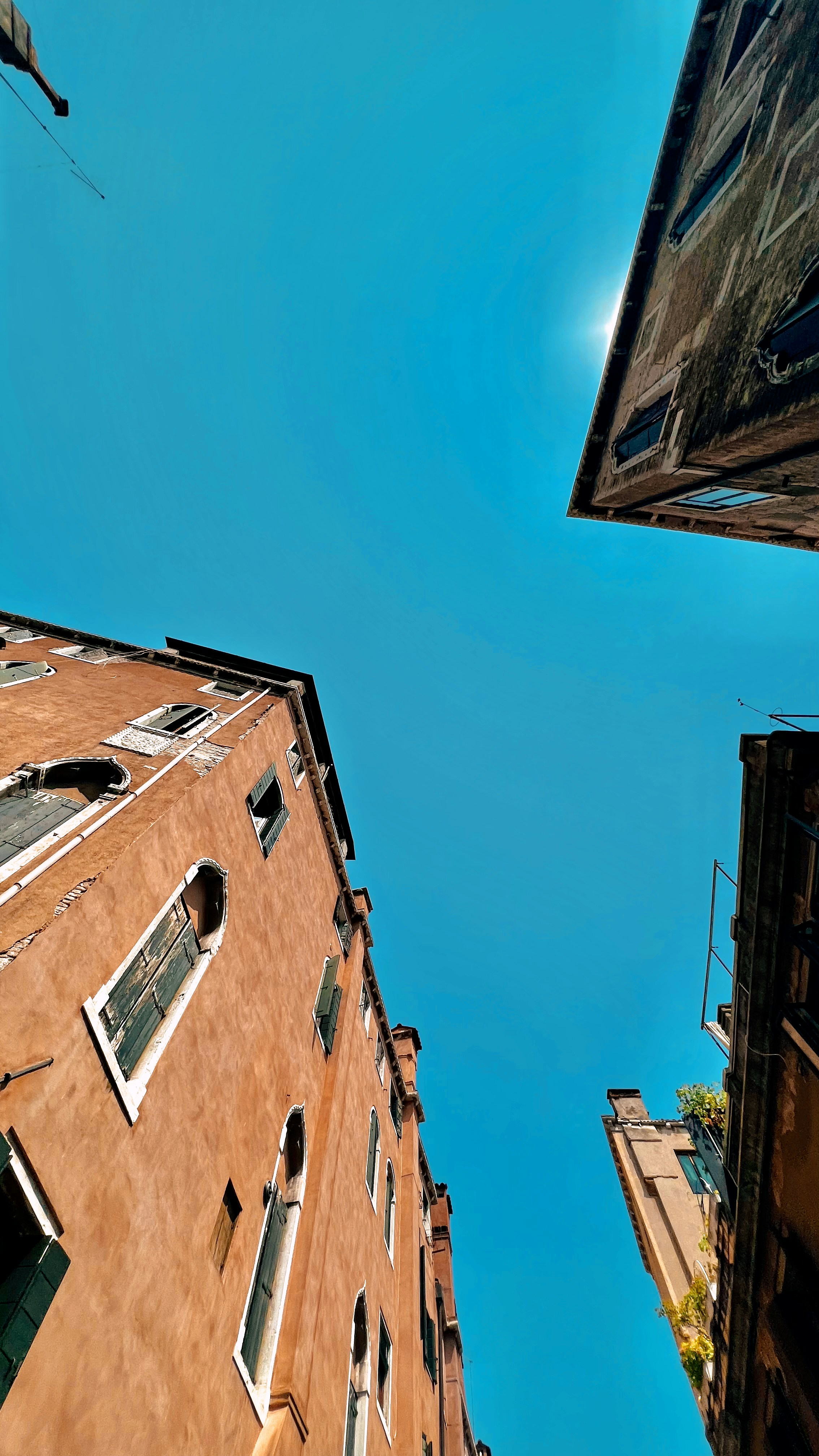 Looking up at a building in a city