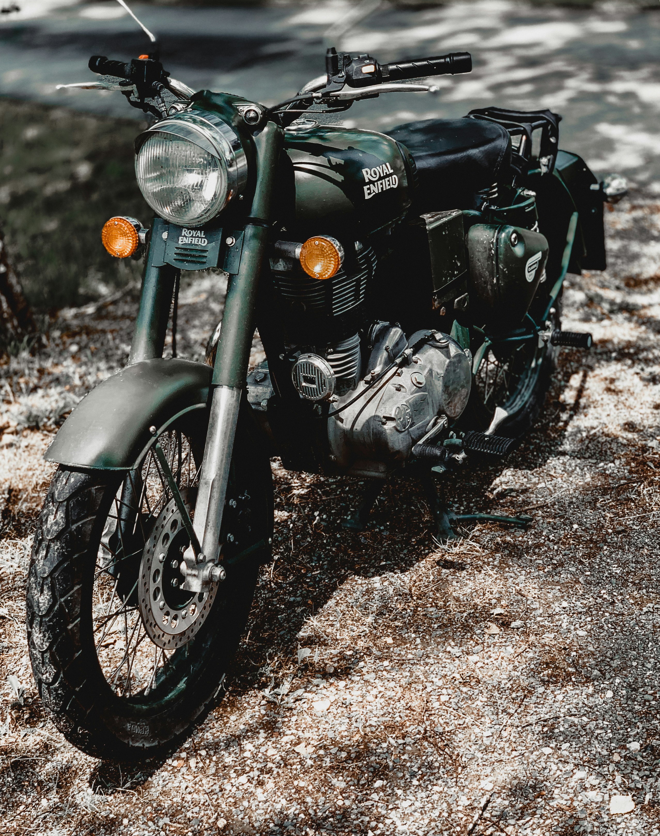 A motorcycle parked on the side of a road