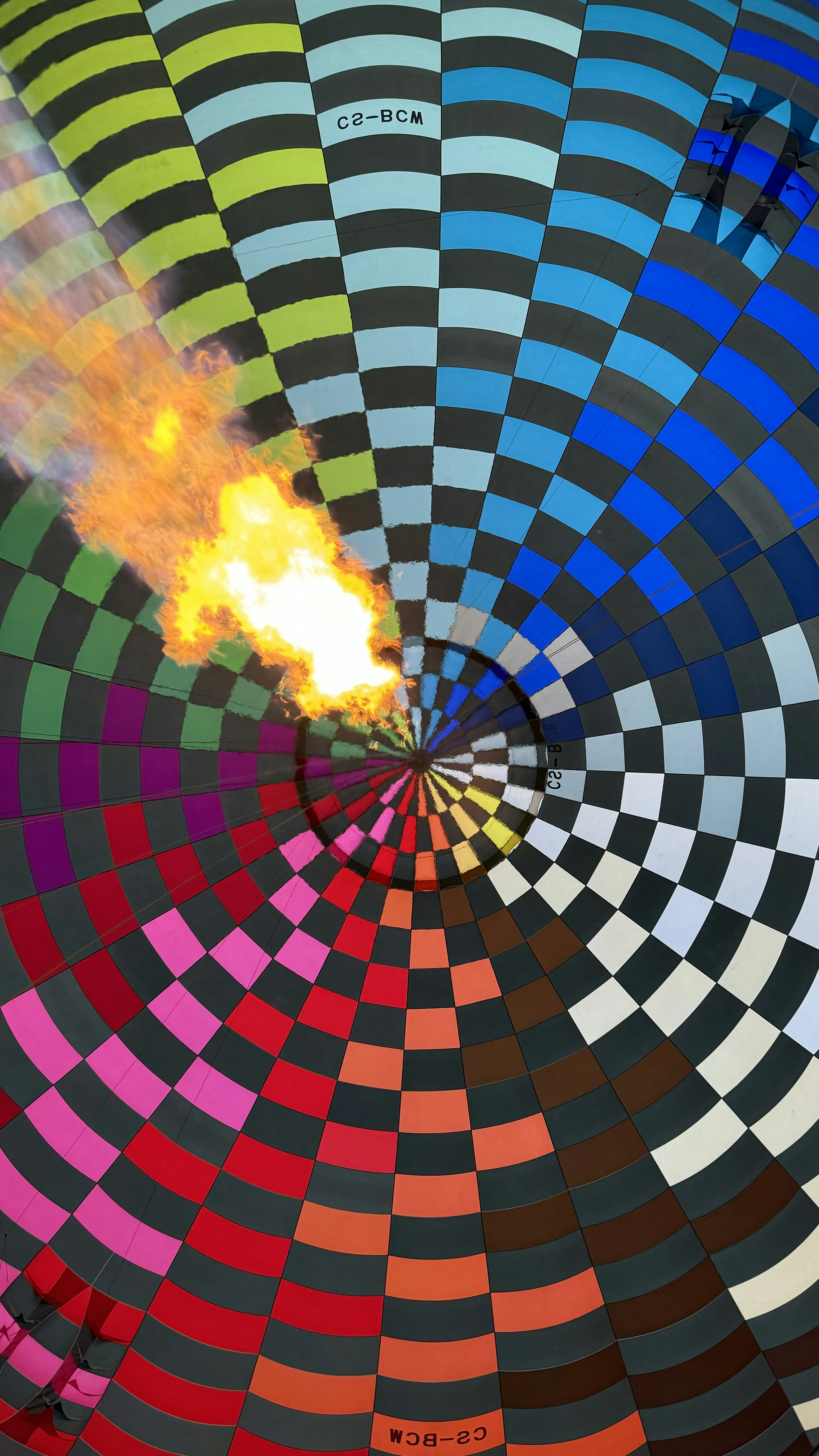 A large colorful object with a fire in the middle of it