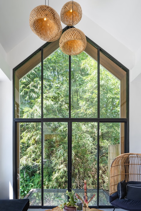 A living room filled with furniture and a large window