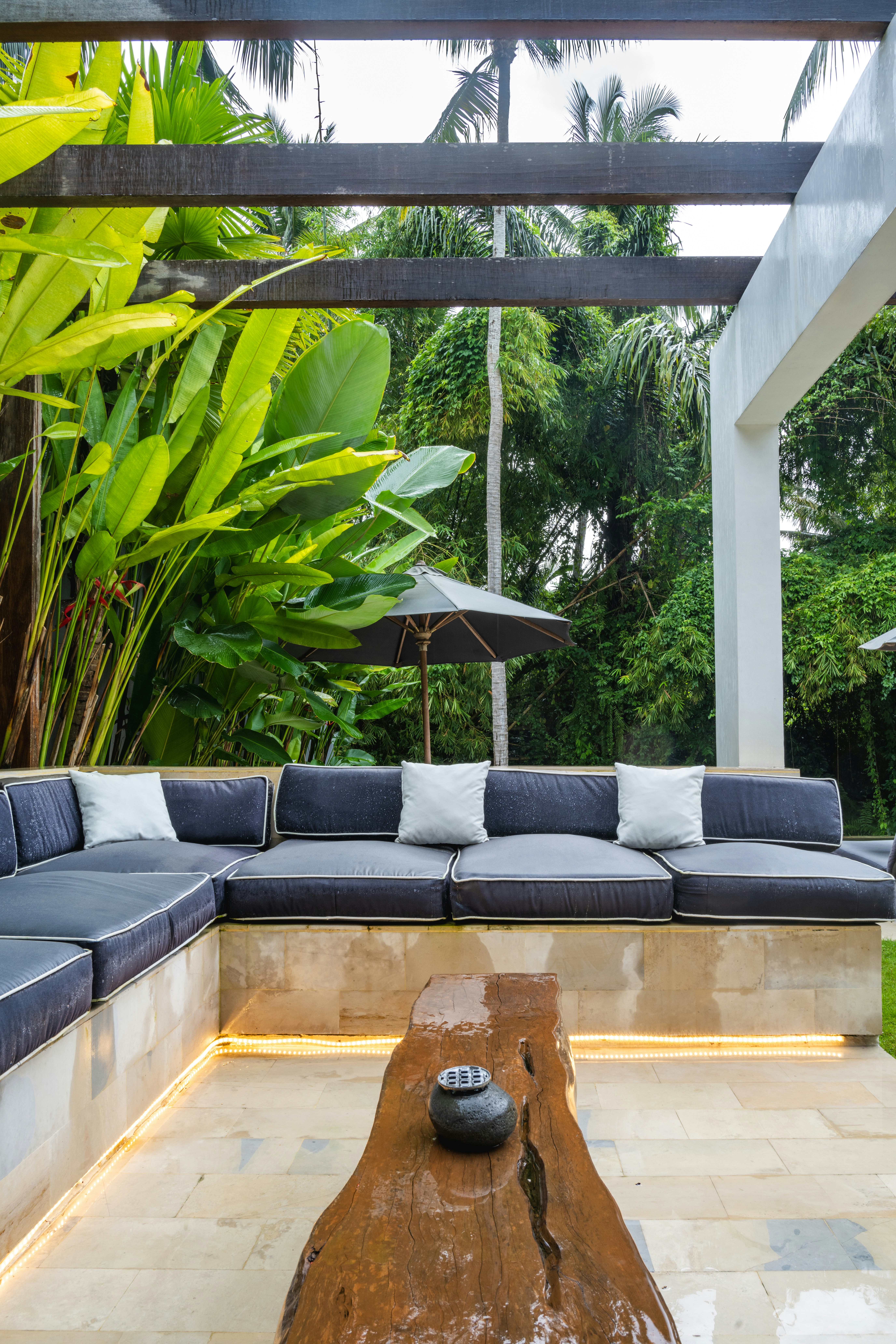 A living room with a couch and a table