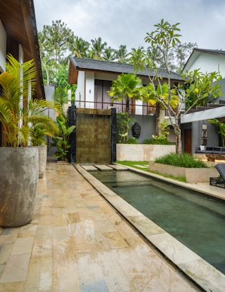 A house with a pool in the middle of it