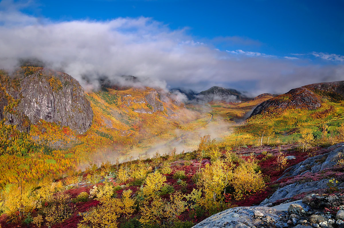 Fog lifting off autumn tundra and granite domes in Parc des Grands-Jardins, Charlevoix