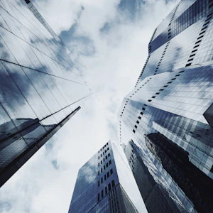 Looking up at tall buildings in a city