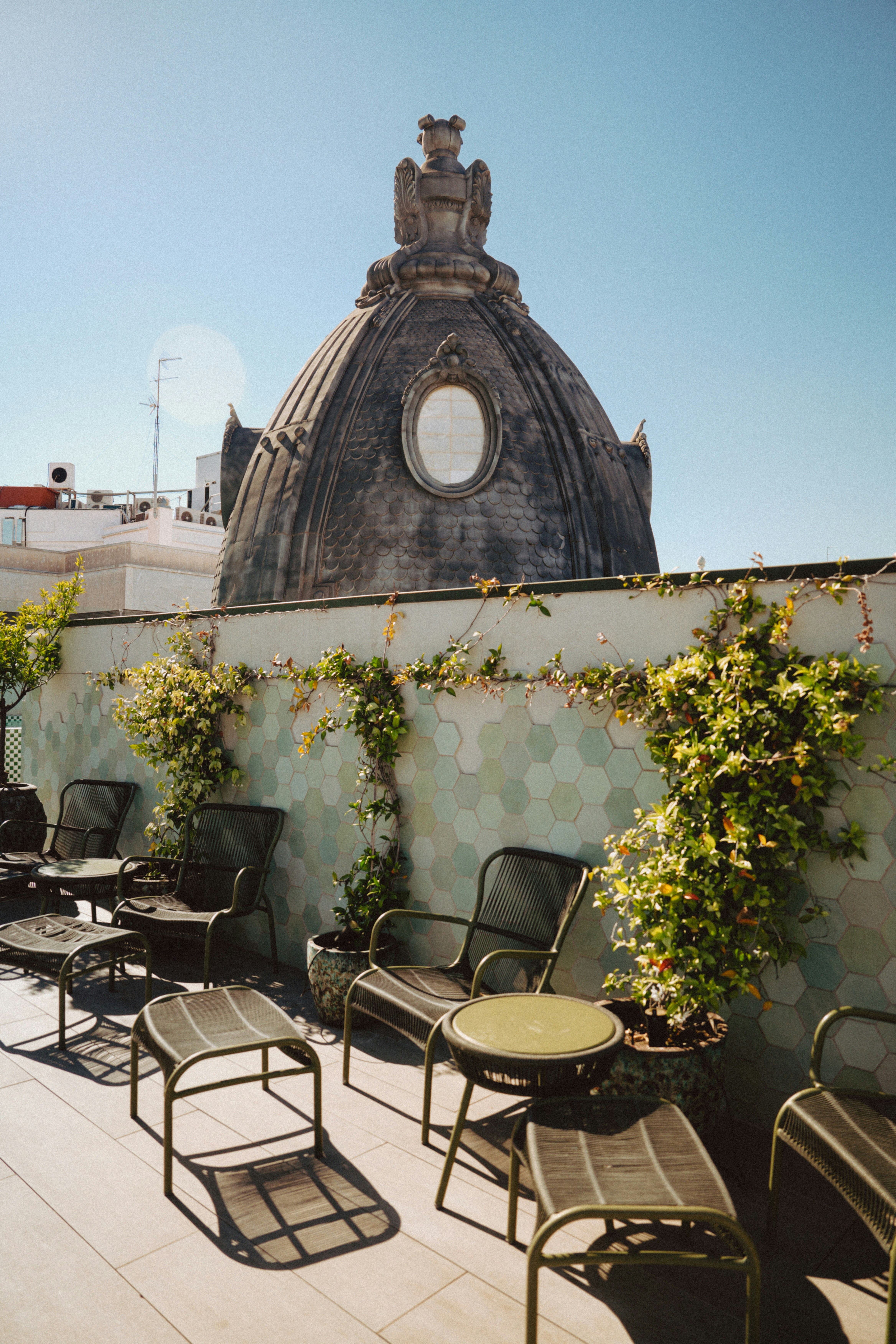 A row of chairs sitting on top of a roof