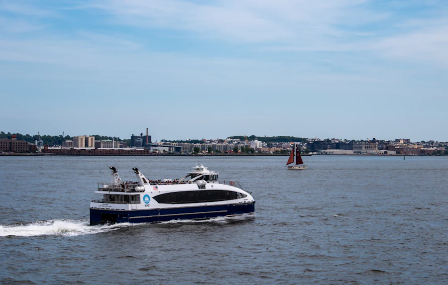 A boat on the water near the Manhattan skyline