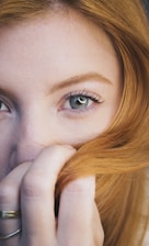 A close up of a person with red hair