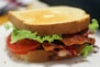 A bacon, tomato and lettuce sandwich on a plate