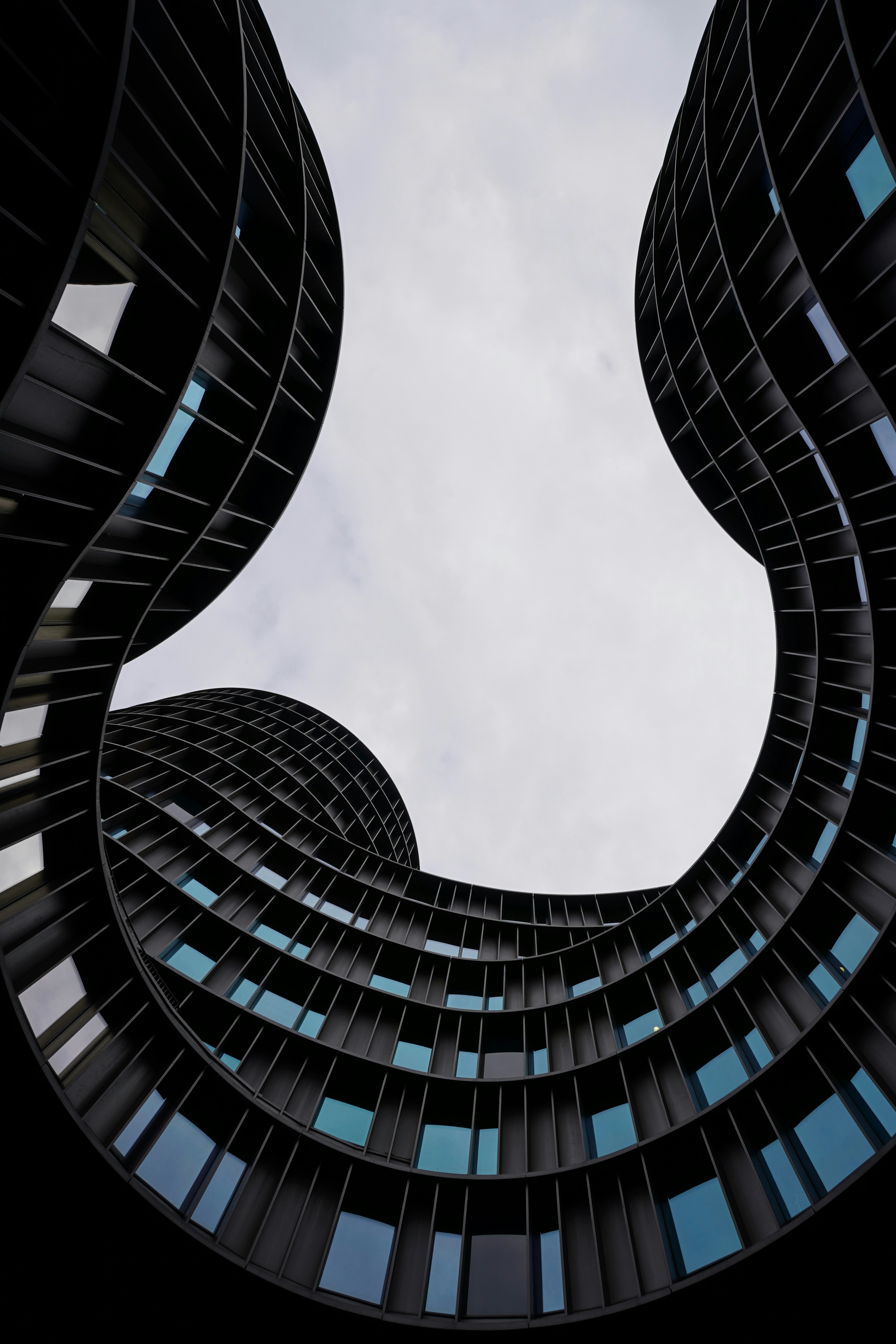 A very tall building with a sky in the background