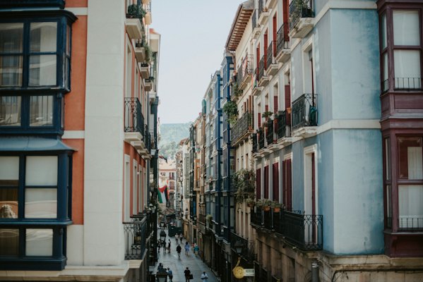 A city street filled with lots of tall buildings — Bilbao, Spain
