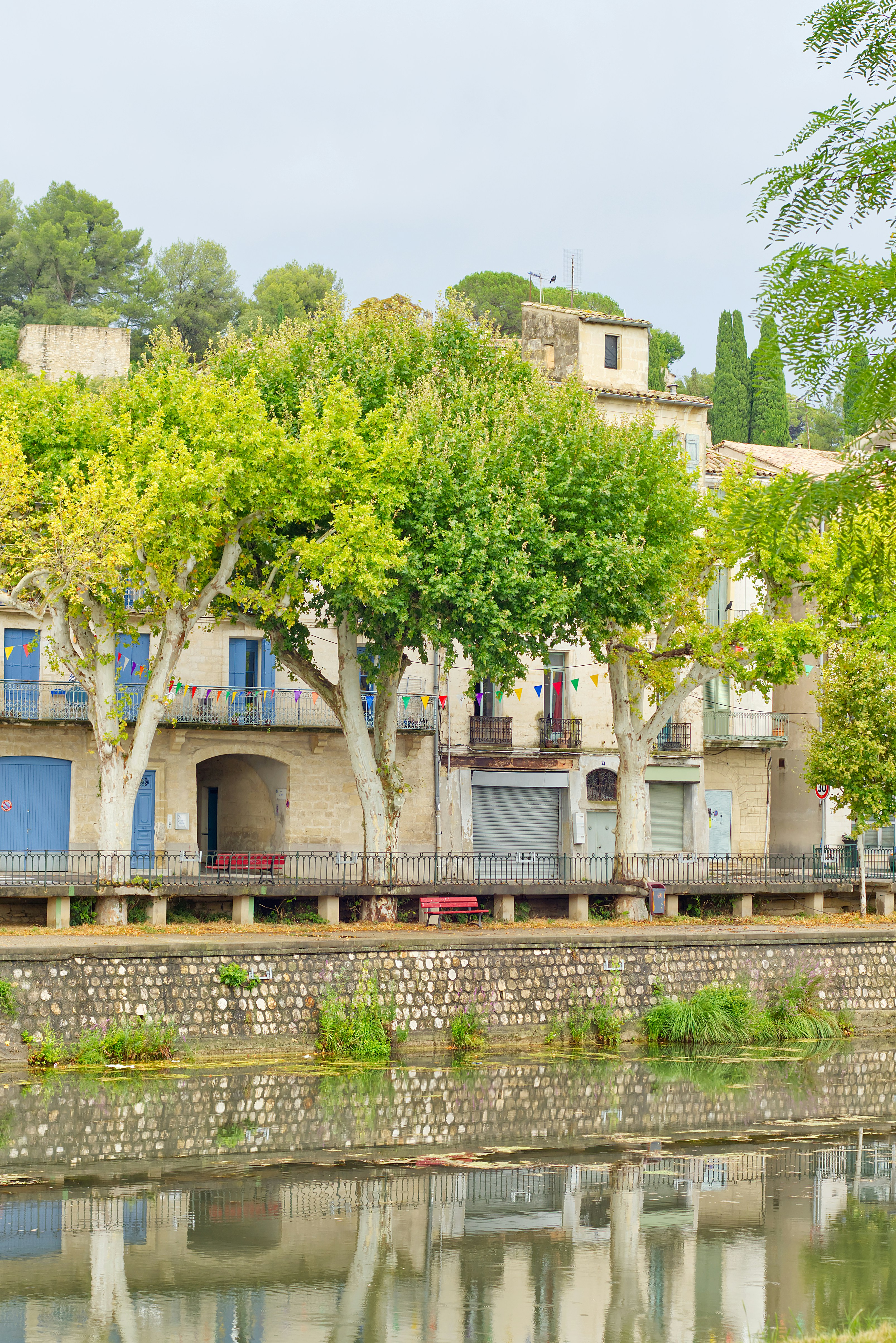 A row of houses next to a river