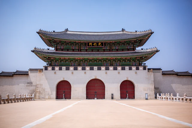 Gwanghwamun gate, the main entrance to Gyeongbokgung Palace, in daylight.