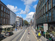 A city street filled with lots of traffic