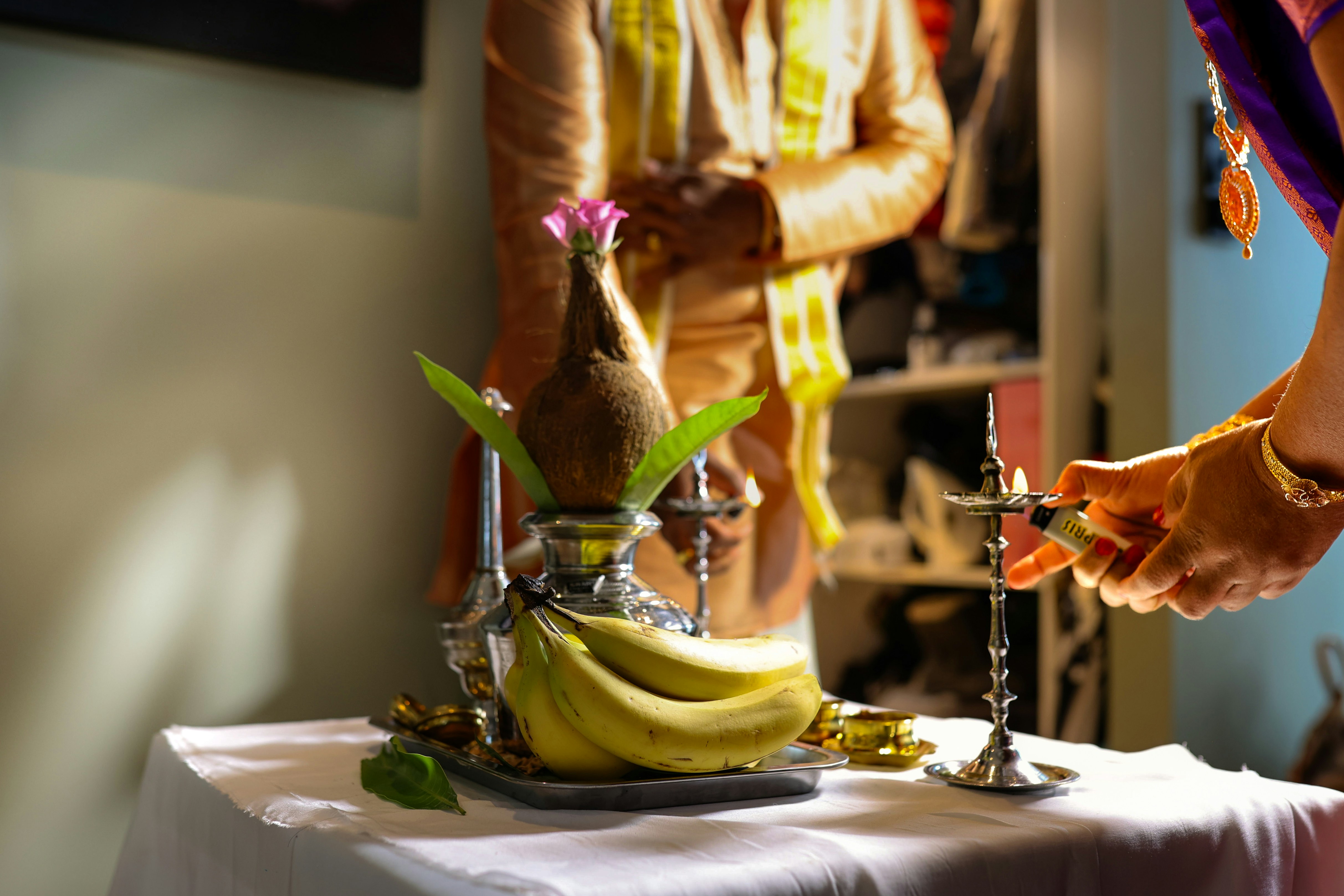woman wearing yellow long-sleeved dress under white clouds and blue sky during daytime