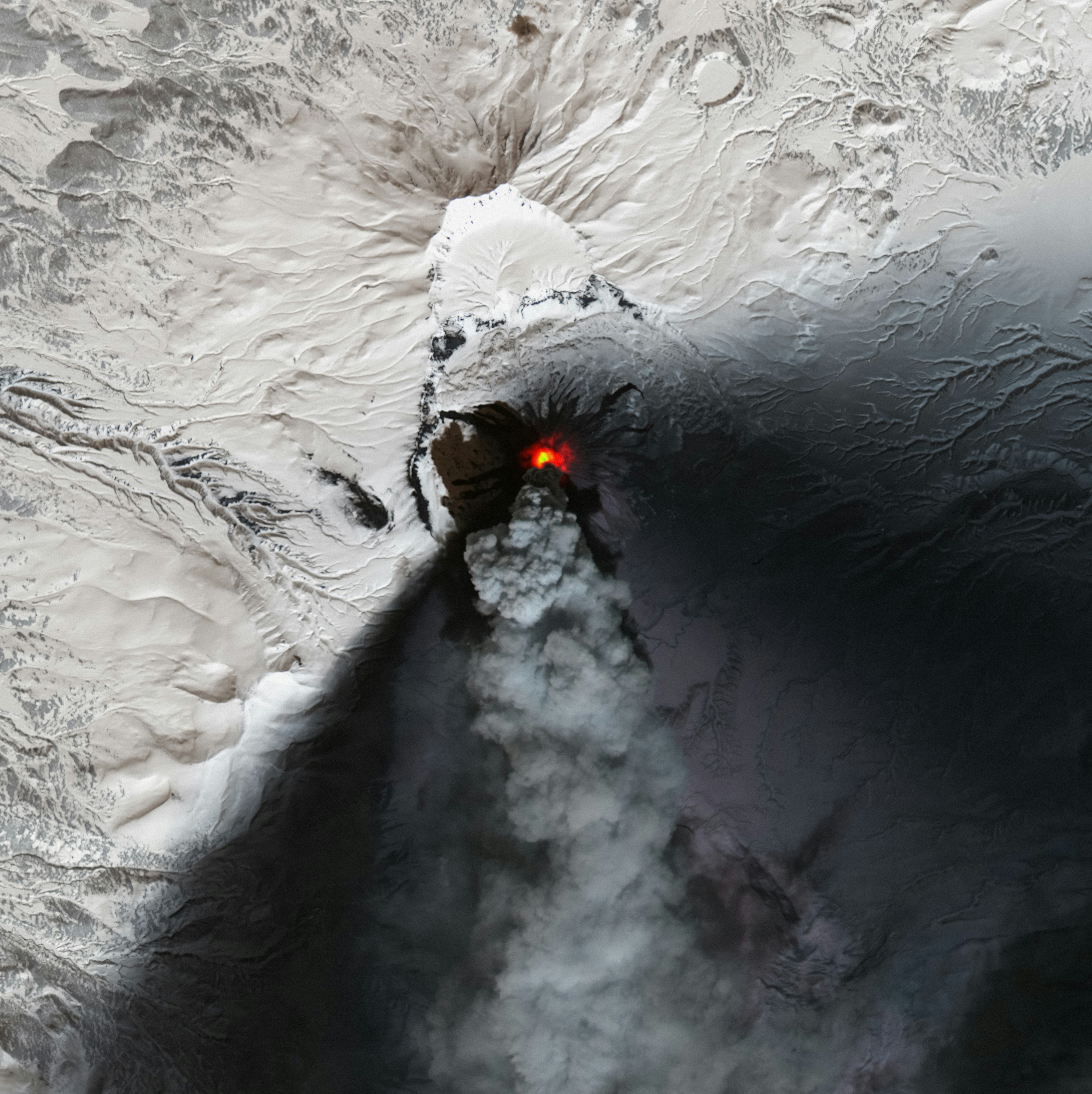Landsat 8 image of Karymsky volcano, April 20, 2022 Detailed Description Karymsky volcano, one of the most active volcanoes of Kamchatka's eastern volcanic zone, erupted on April 20, 2022. This pan-sharpened Landsat 8 image captured the event. Overlaying the infrared data over the natural color image highlights the heat signature of the active flows.