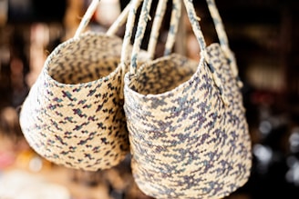 A couple of baskets hanging from a ceiling