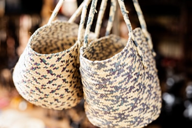 A couple of baskets hanging from a ceiling