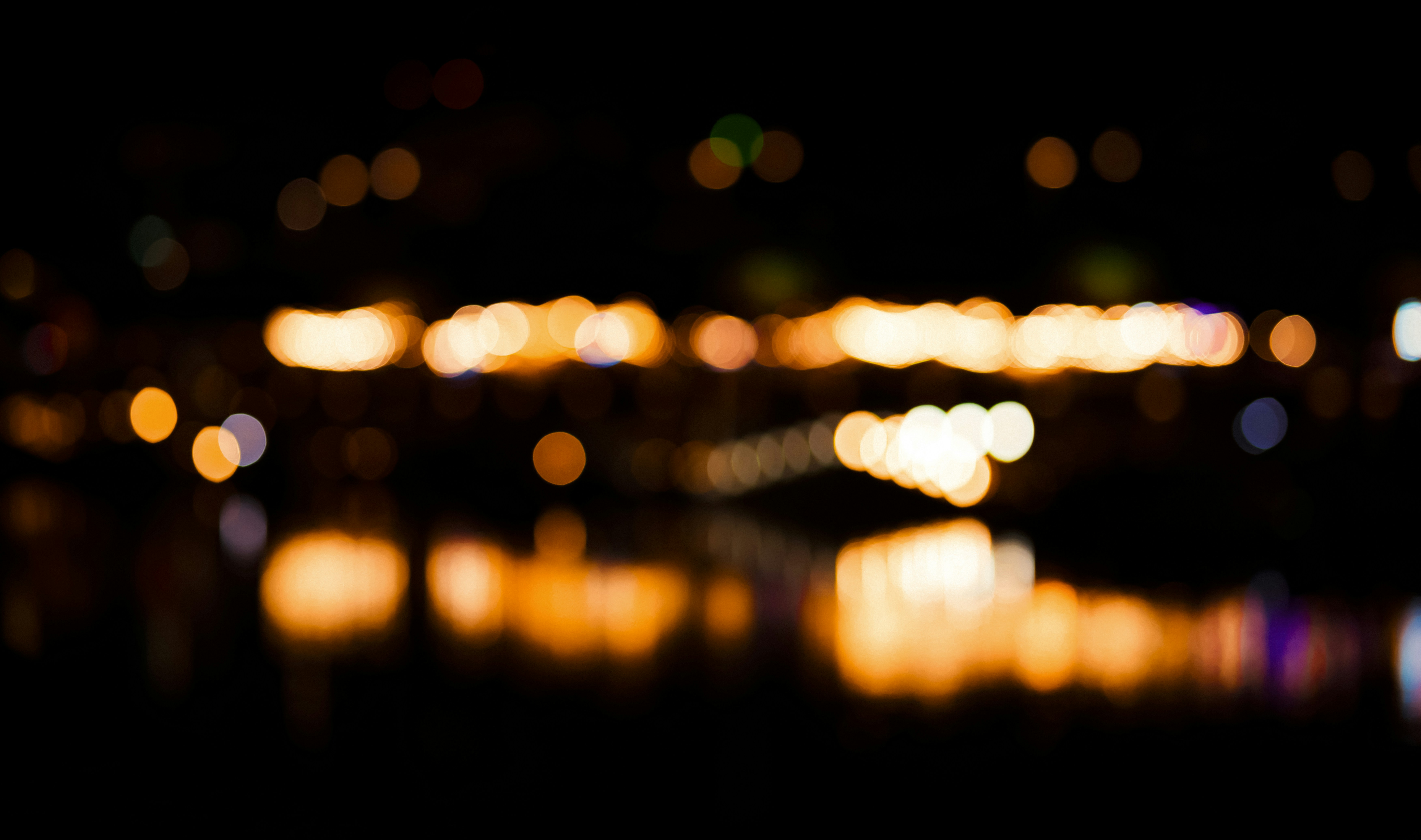 A blurry photo of a city at night