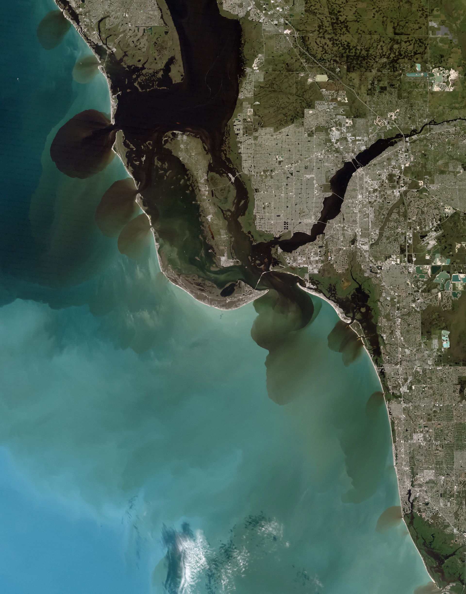 Aerial view of a coastal city and bay
