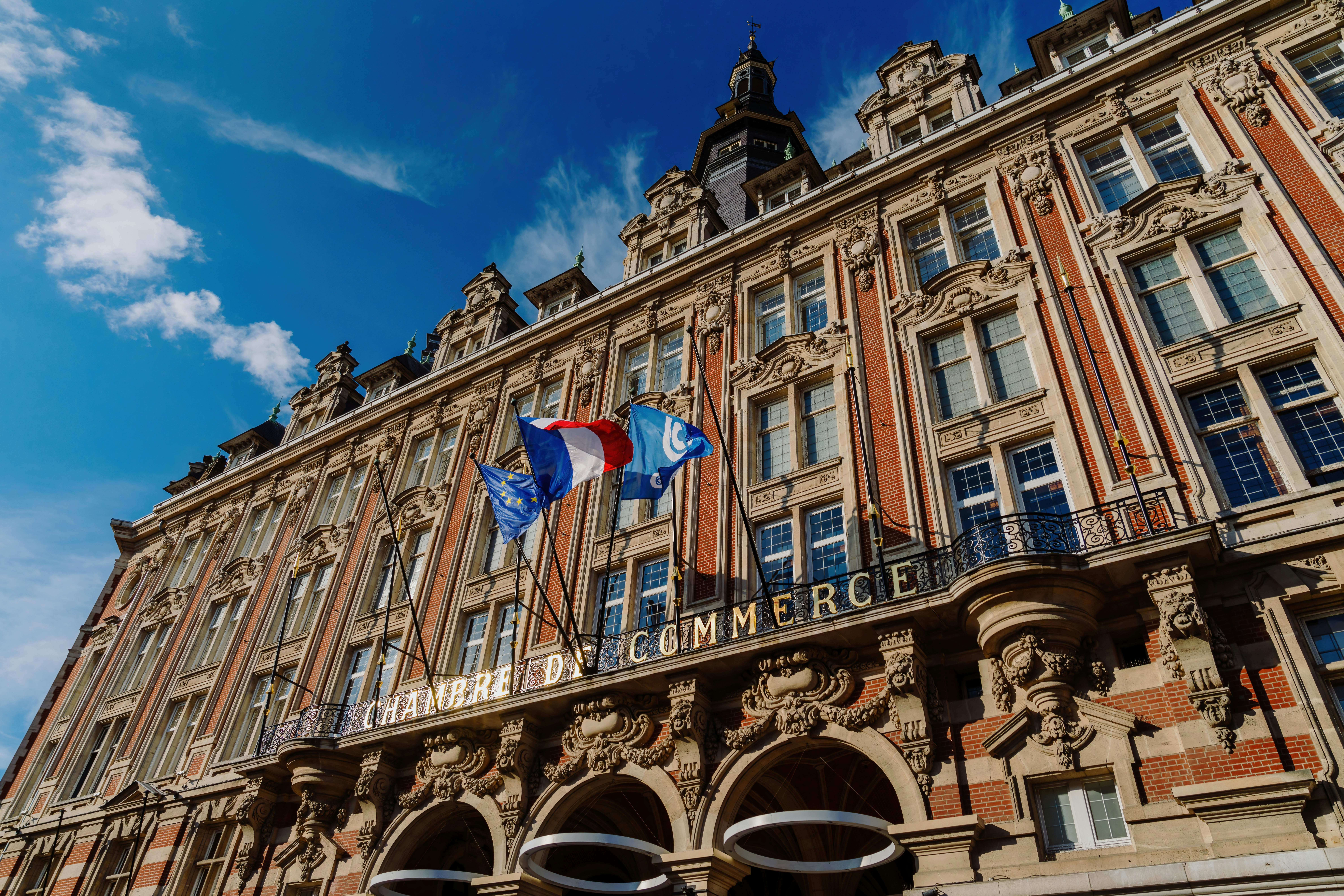 A large building with a flag on top of it