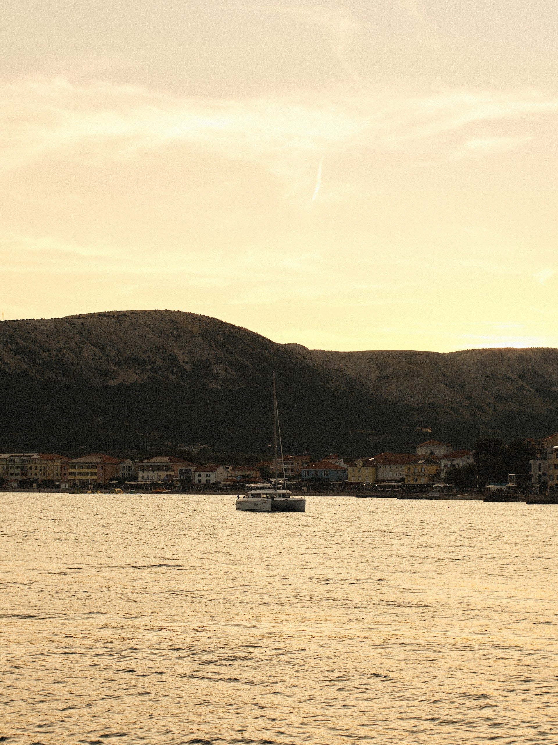 A body of water with a boat in the distance