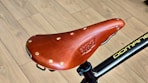 A close up of a bike seat on a bike