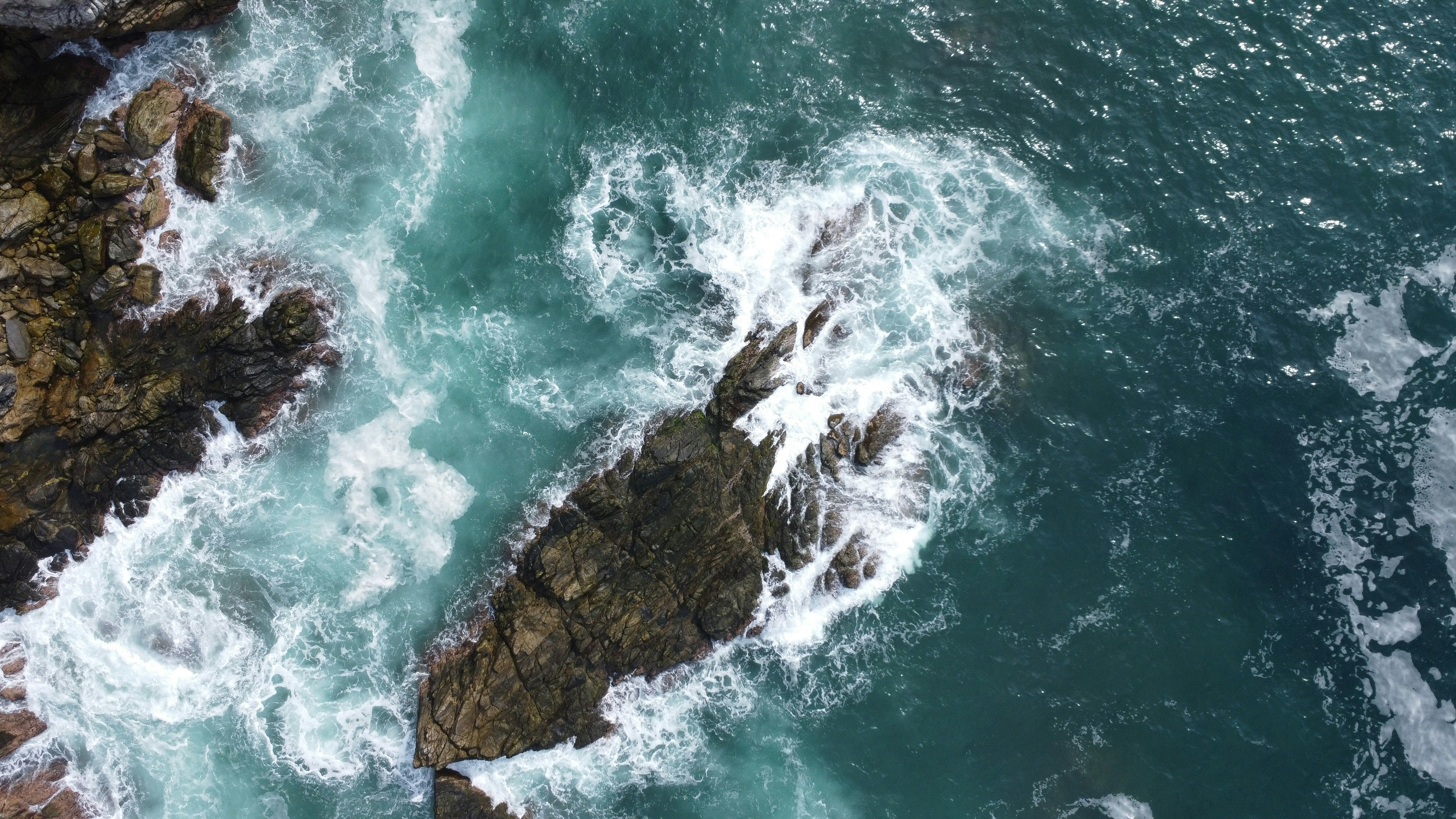Aerial view of ocean and rocks near Huatulco, Mexico