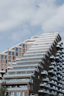 A tall building with balconies on top of it