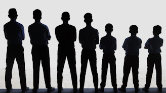 A group of people standing next to each other