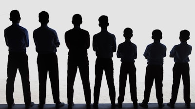 A group of people standing next to each other