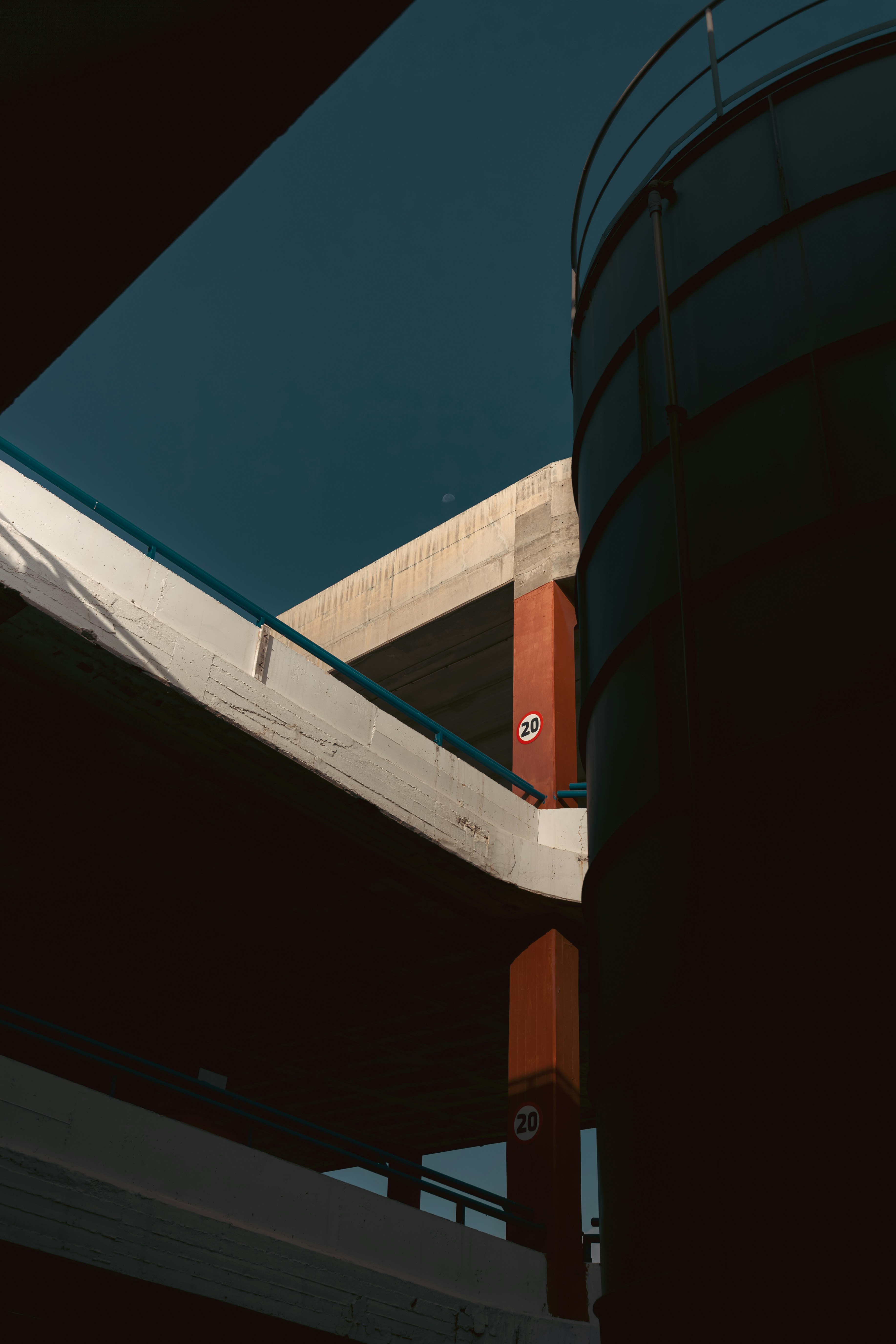 A black and white photo of a water tower