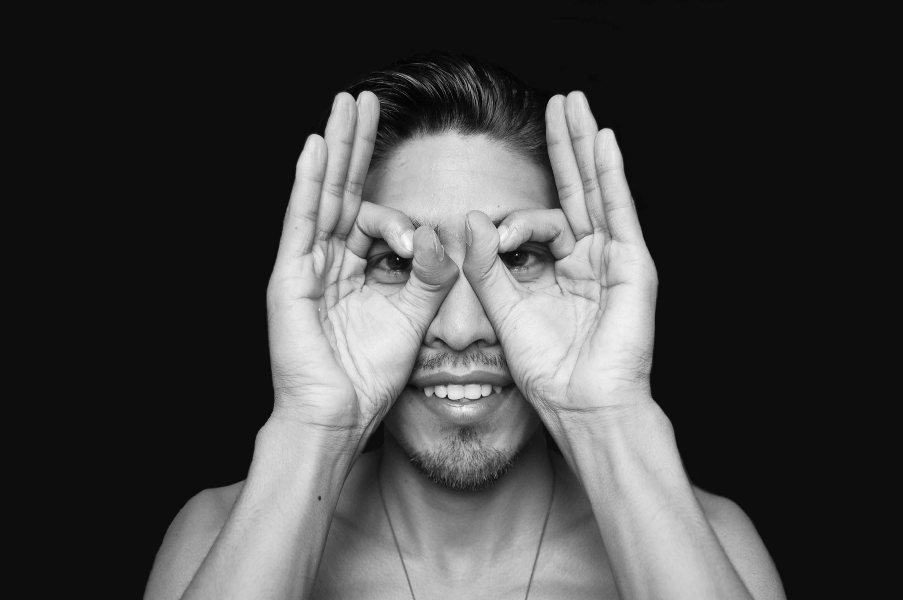 A woman covering her eyes with her hands