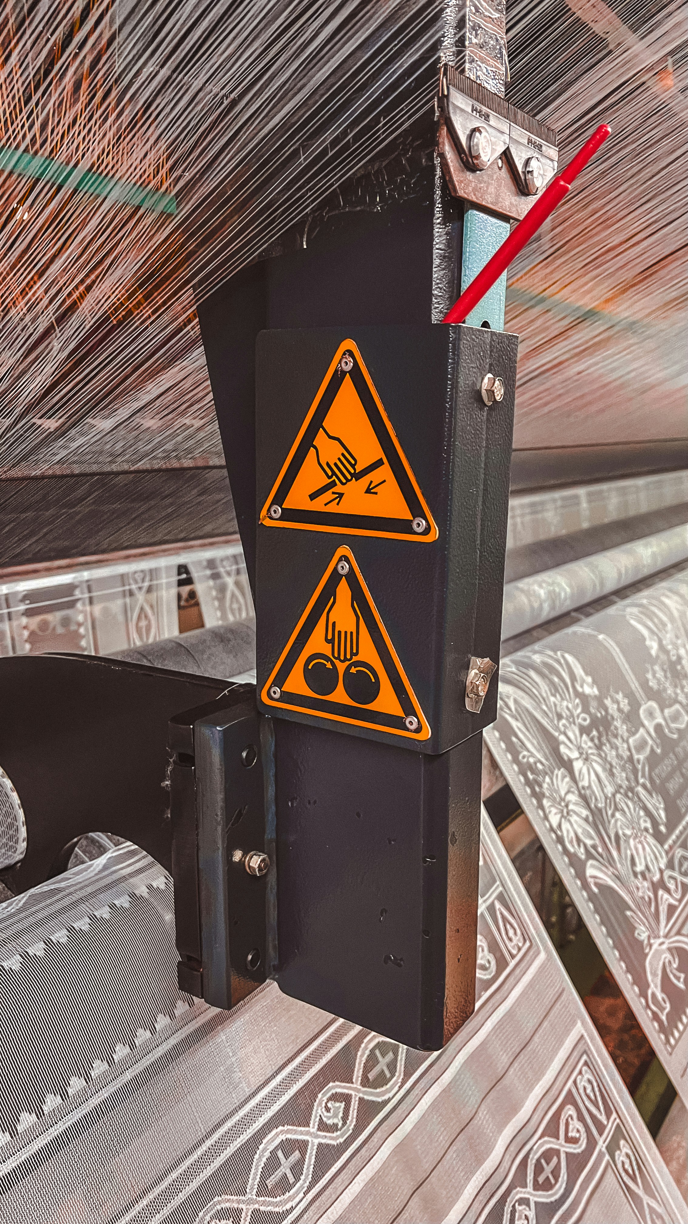 A machine with a warning sign on it