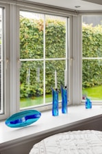 A room with a large window and a table