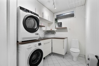A washer and dryer in a small room