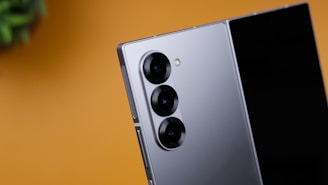 A close up of a cell phone on a table