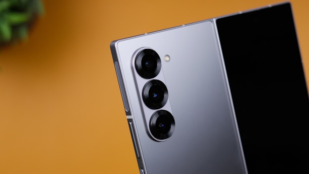 A close up of a cell phone on a table
