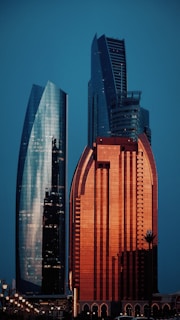 A very tall building sitting next to a very tall building